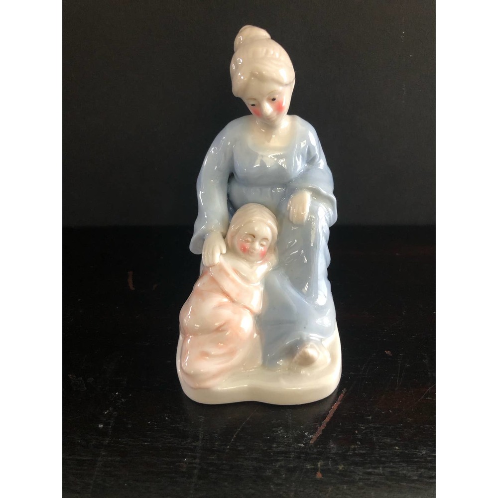 Antique porcelain figurine Mother and Child Embrace